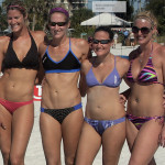 four amazing athletic girls in bathing suits