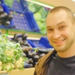 smiling man in supermarket